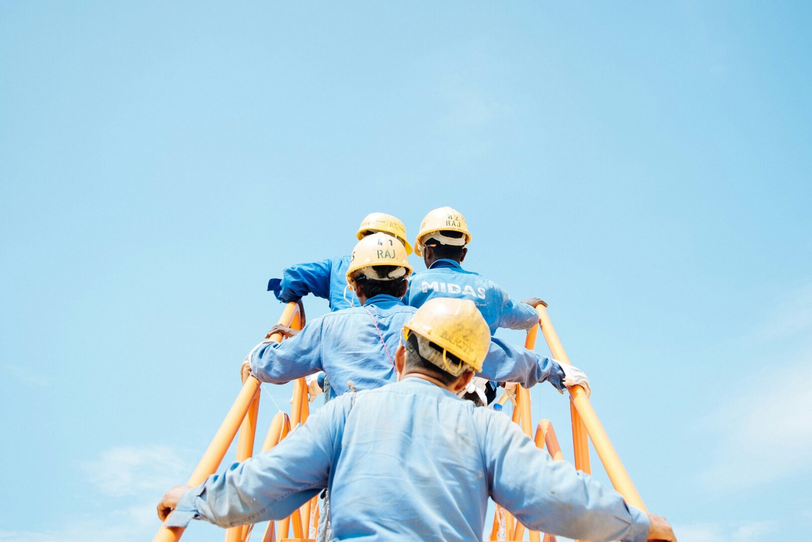 men wearing hard hats